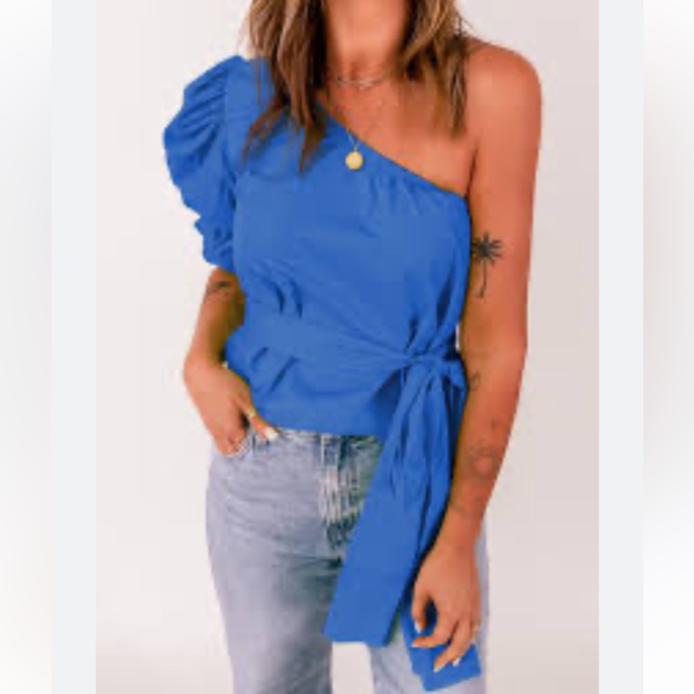 Sky blue one shoulder crop top with ties in the back.